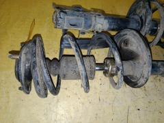 Стойка амортизатора 333476, 4060A198, MR594045, SST0165 на Mitsubishi Colt Z25A 4G19 Фото 6