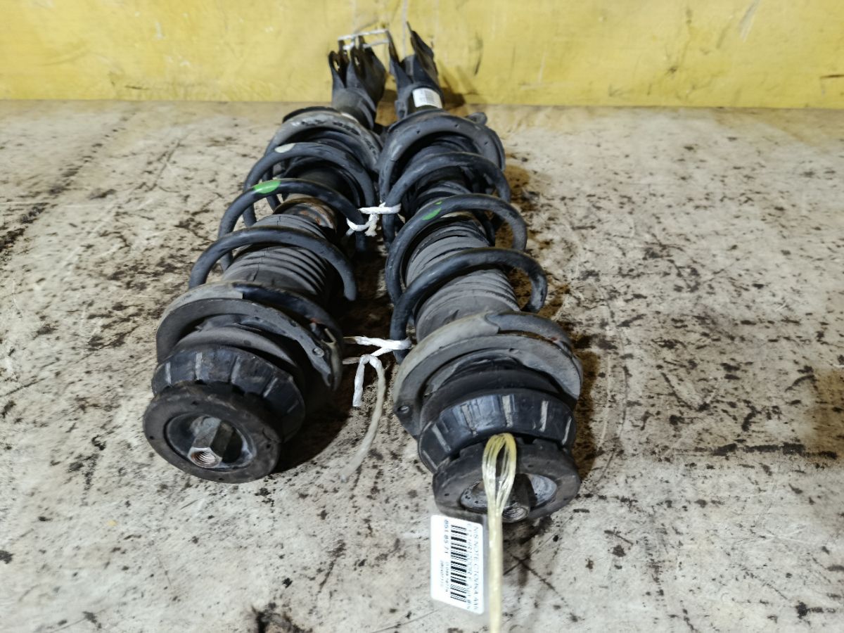 Стойка амортизатора на Nissan Note E12 HR12DDR Фото 3