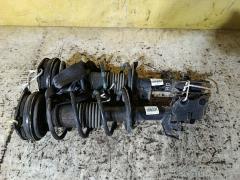 Стойка амортизатора на Nissan Tiida C11 HR15DE Фото 2