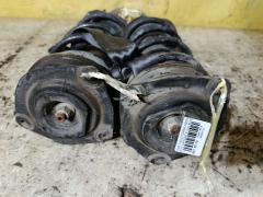 Стойка амортизатора на Nissan Tiida C11 HR15DE Фото 3