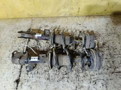 Стойка амортизатора на Nissan Tiida Latio SC11 HR15DE Фото 2