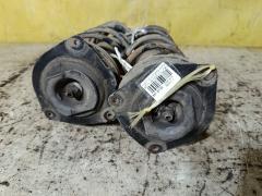 Стойка амортизатора на Nissan Tiida Latio SC11 HR15DE Фото 3