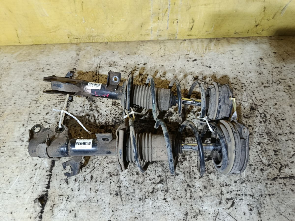 Стойка амортизатора на Nissan Tiida Latio SC11 HR15DE Фото 2