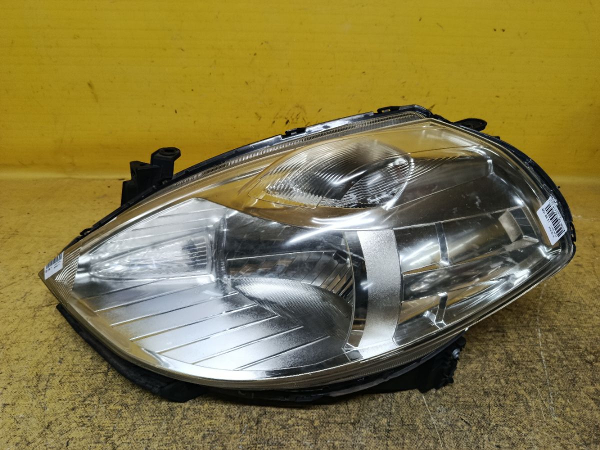 Фара P7779 P7779, на Nissan Tiida C11 Фото 1