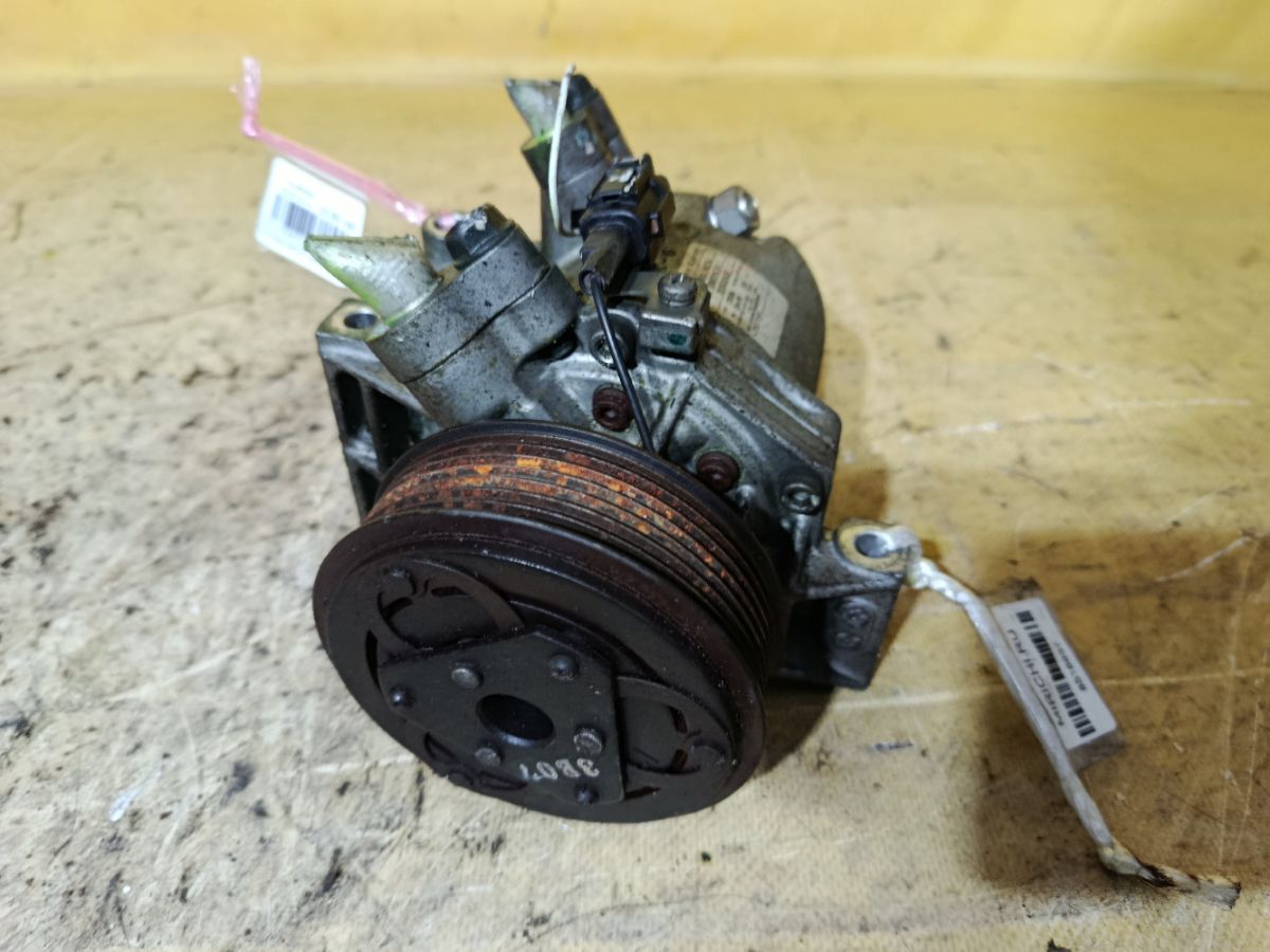 Компрессор кондиционера 92600-1HC1A на Nissan March K13 HR12DE Фото 5