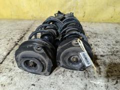 Стойка амортизатора на Nissan Tiida C11 HR15DE Фото 4