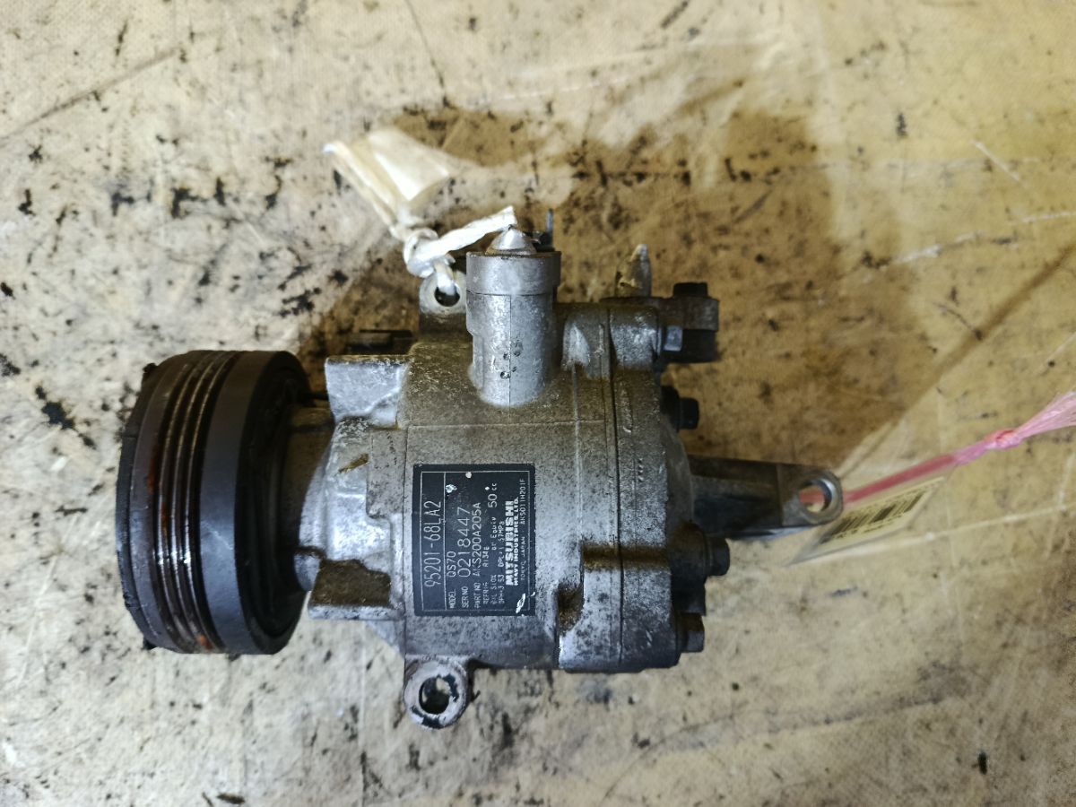 Компрессор кондиционера 95201-68LA2 на Suzuki Solio MA15S K12B Фото 2