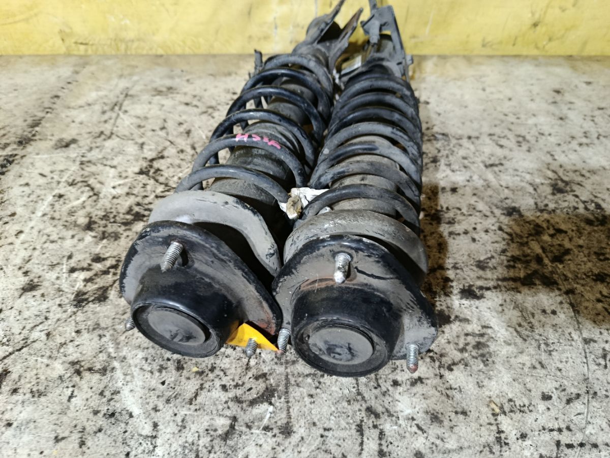 Стойка амортизатора 8058015, CR-049-1581, CR-049F-H53A, CR8828, MR519207, SJ-049-1581, ST-049-1581 на Mitsubishi Pajero Mini H58A 4A30 Фото 3