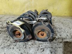 Стойка амортизатора на Nissan Note E11 HR15DE Фото 2