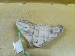 Крепление бампера 52115-B1050 на Toyota Passo KGC30 Фото 4