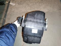 Корпус воздушного фильтра 17700-21120 на Toyota Ractis NCP120 1NZ-FE Фото 7