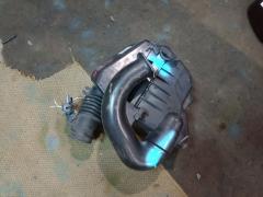 Корпус воздушного фильтра 17700-21120 на Toyota Ractis NCP120 1NZ-FE Фото 9