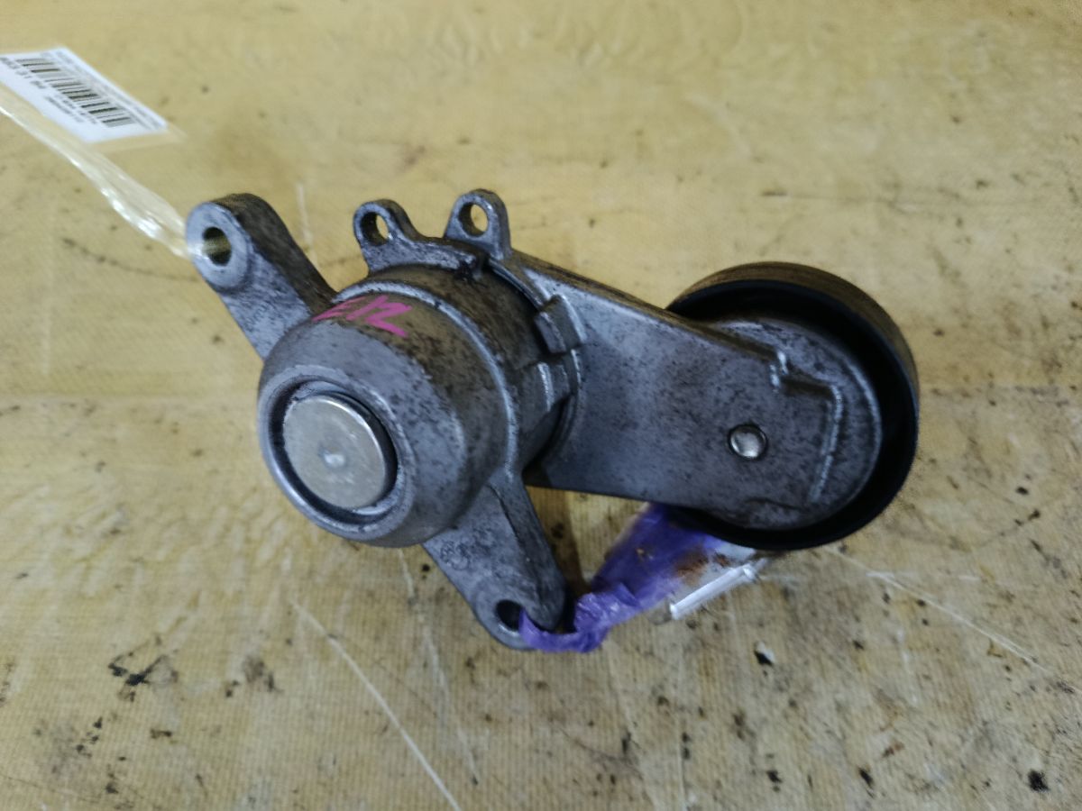 Ролик натяжной на Nissan Note E12 HR12DDR Фото 4