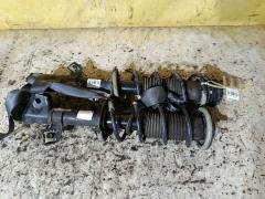 Стойка амортизатора на Nissan Note E12 HR12DDR Фото 2