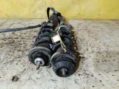 Стойка амортизатора на Nissan Note E12 HR12DDR Фото 4