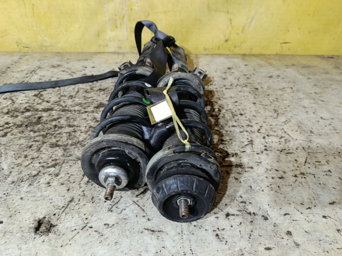 Стойка амортизатора на Nissan Note E12 HR12DDR Фото 4