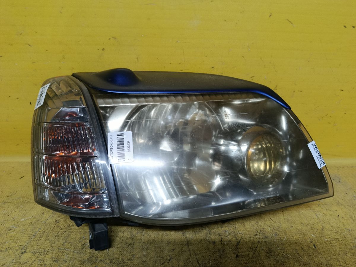 Фара 1669 1669, на Nissan X-Trail NT30 Фото 1