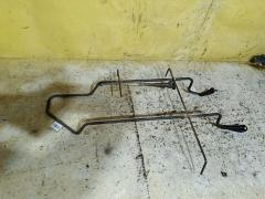 Крепление запасного колеса на Toyota Isis ANM10G Фото 3