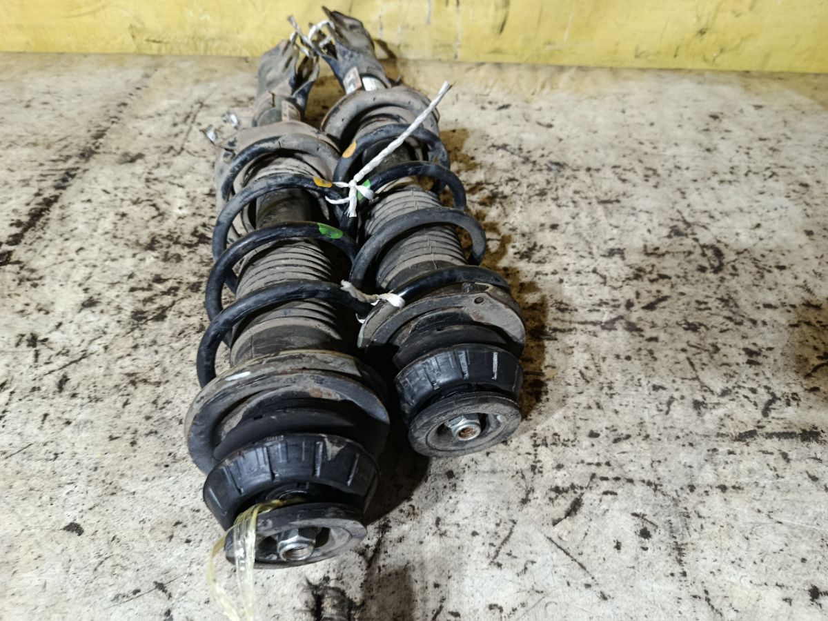 Стойка амортизатора на Nissan Note E12 HR12DDR Фото 3