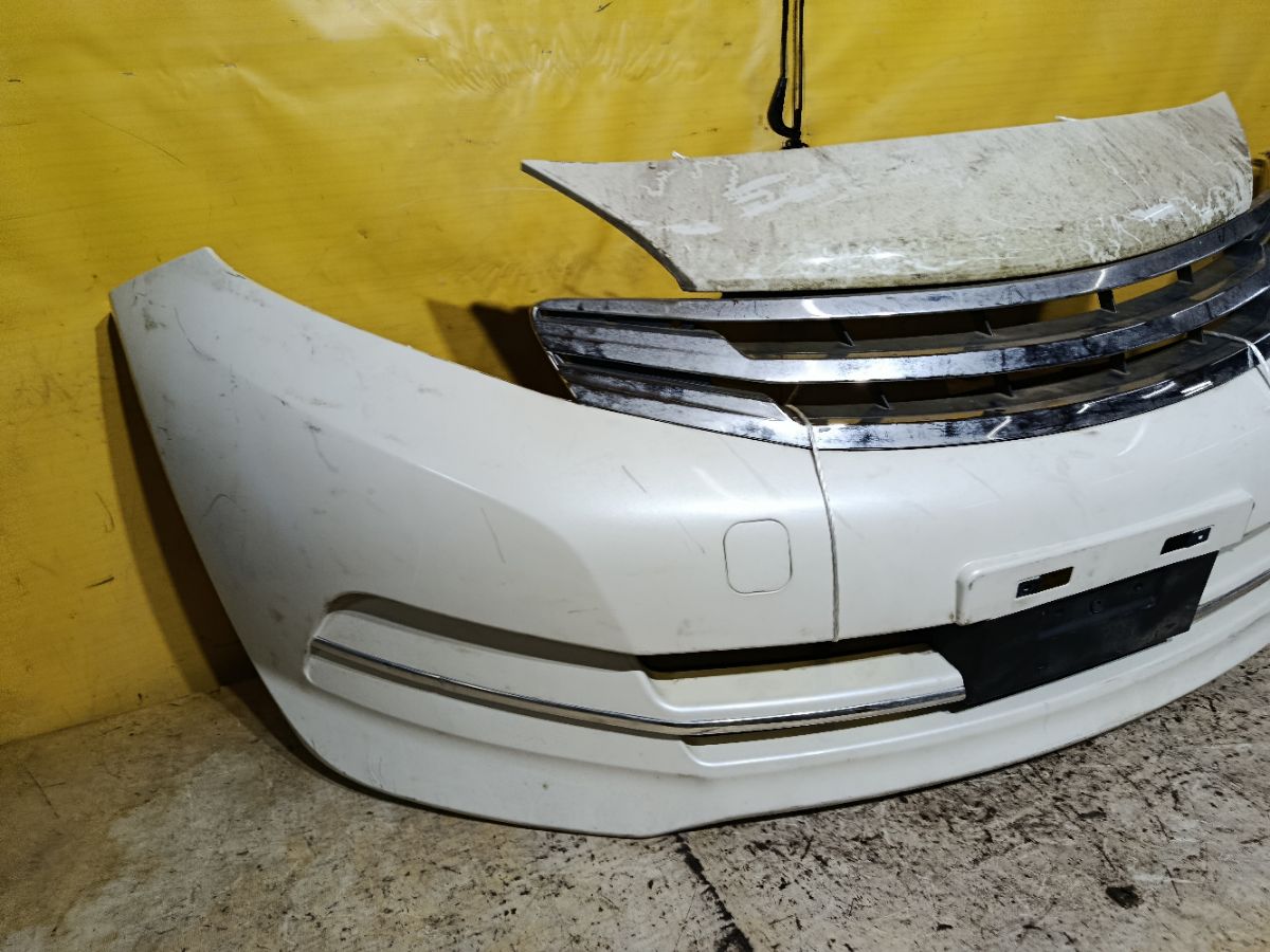 Бампер 62022-8A00X на Nissan Note E12 Фото 6