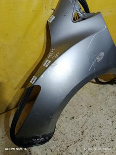 Крыло переднее 2741657, 3421311, 3421311A1, 4533011, 4533011J, 5605007, 6504043421311P, 931171, D01G52211B, D651-52-211B, DD1052211C, GDFN0061L, MD234021FL, MZ10069AL, MZ10069BL, MZ10069BLV, MZ3093024, MZ51101600L00, MZ51101601L00, MZX0207270L на Mazda Demio DE3FS Фото 2