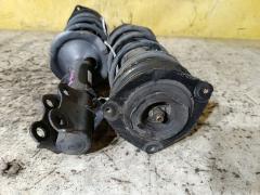 Стойка амортизатора на Nissan Tiida C11 HR15DE Фото 4