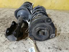 Стойка амортизатора на Nissan Tiida C11 HR15DE Фото 5