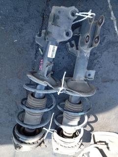 Стойка амортизатора на Nissan Tiida Latio SC11 HR15DE, Переднее расположение