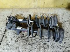 Стойка амортизатора на Nissan Tiida Latio SC11 HR15DE Фото 2