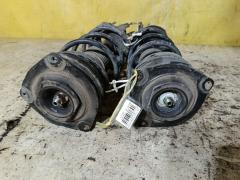 Стойка амортизатора на Nissan Tiida Latio SC11 HR15DE Фото 3