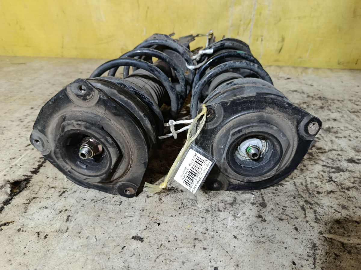 Стойка амортизатора на Nissan Tiida Latio SC11 HR15DE Фото 3