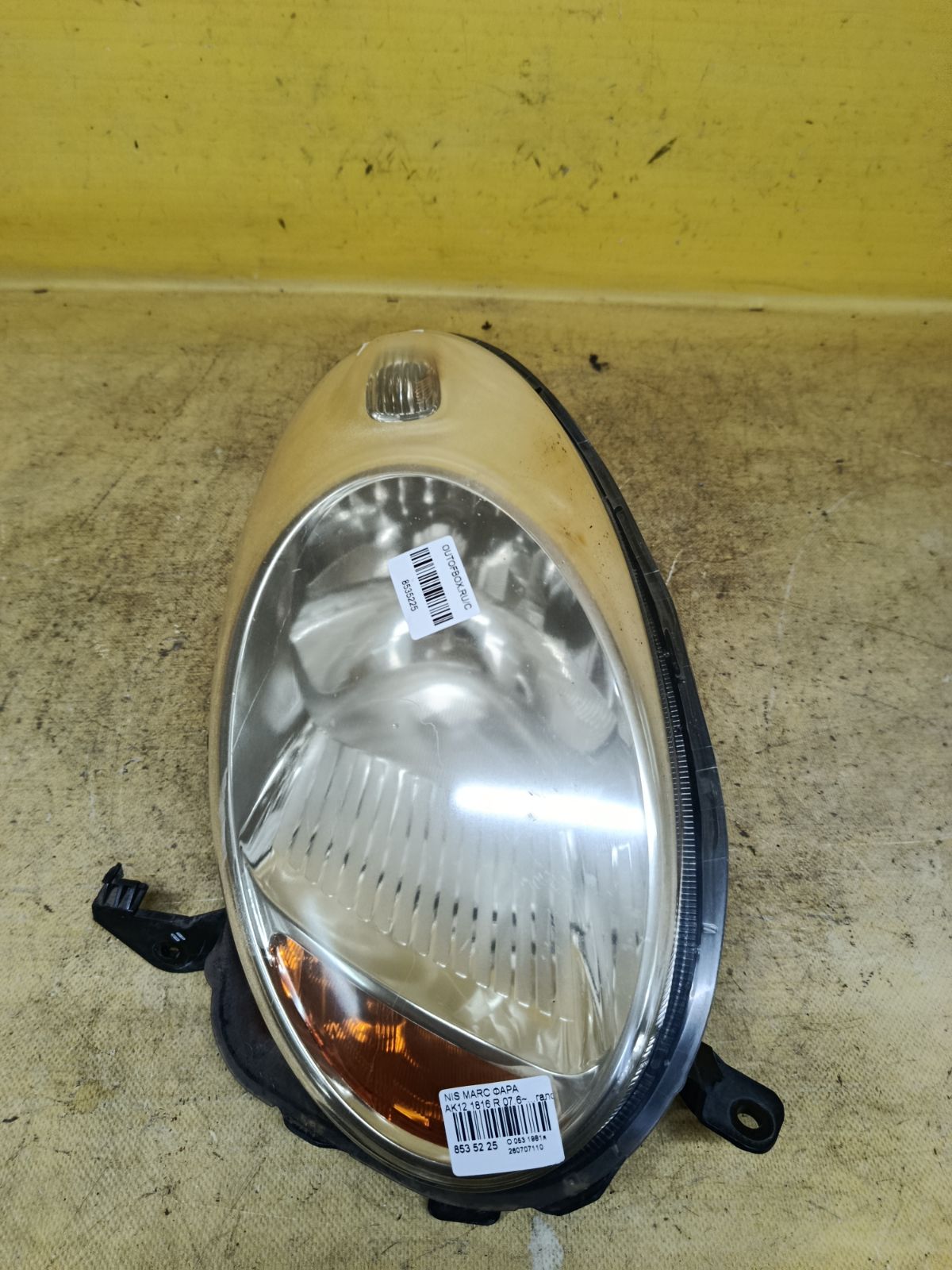 Фара 1816 1816, на Nissan March AK12 Фото 1