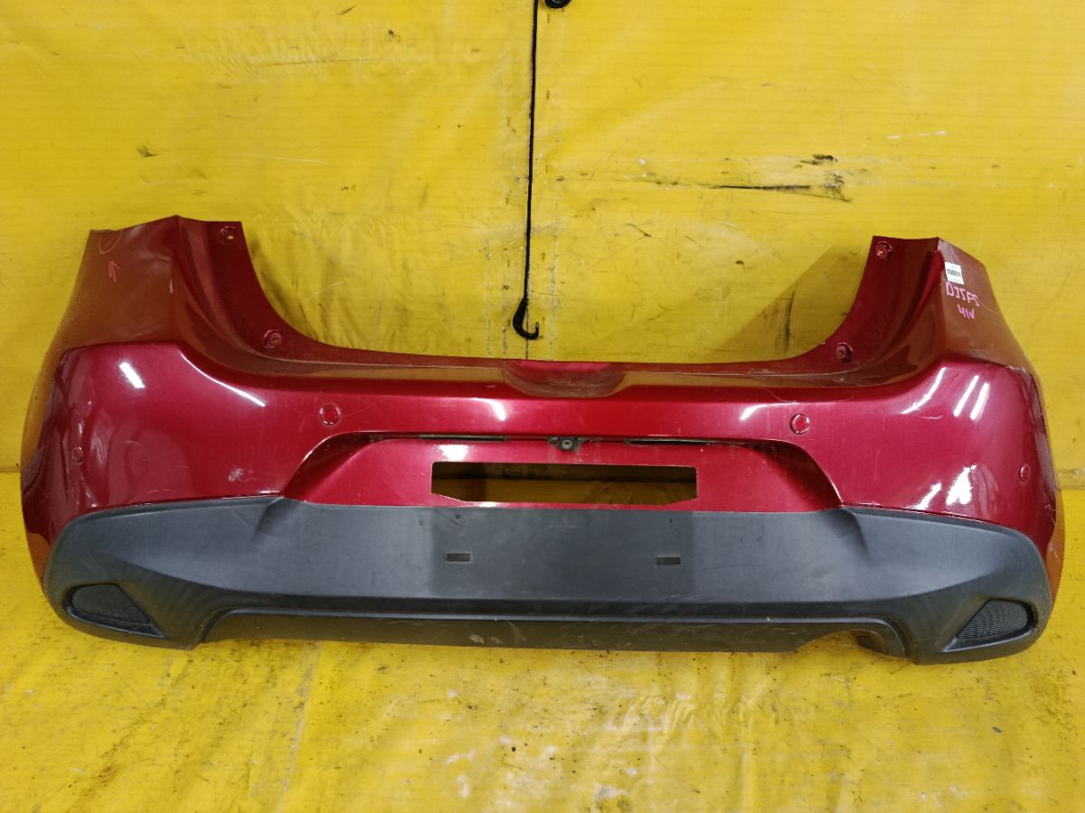 Бампер D09H-50221 на Mazda Demio DE5FS Фото 1
