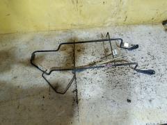 Крепление запасного колеса на Toyota Isis ANM10G