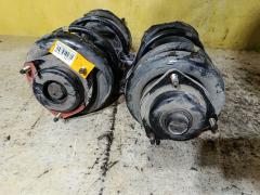 Стойка амортизатора на Nissan Elgrand E51 VQ35DE Фото 5