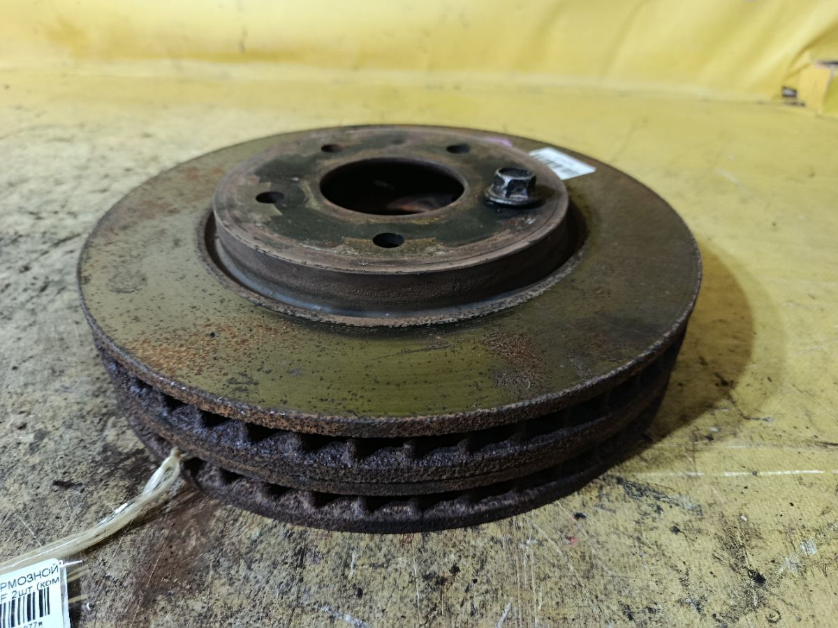 Тормозной диск 40206-CY00A на Nissan Serena C25 MR20DE Фото 1