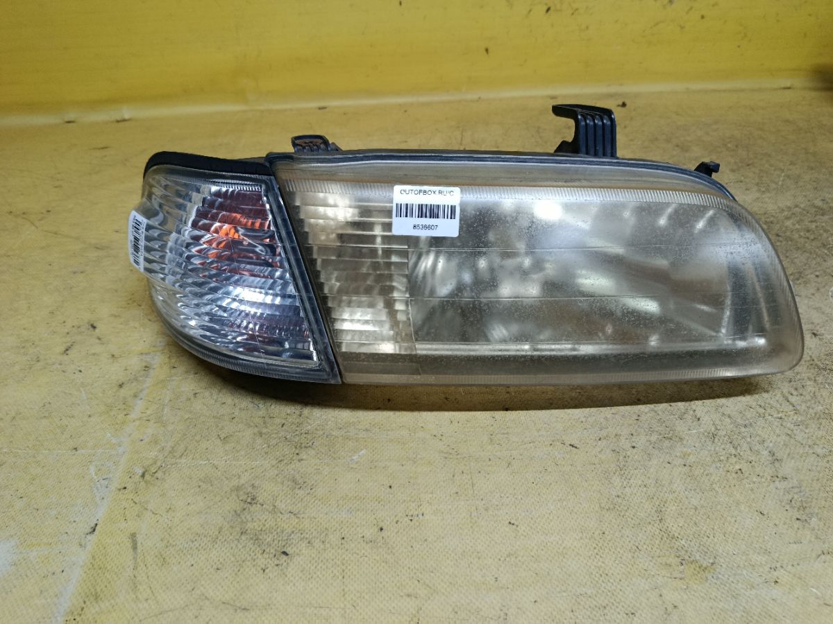Фара 1602 1602, на Nissan Sunny FB15 Фото 1