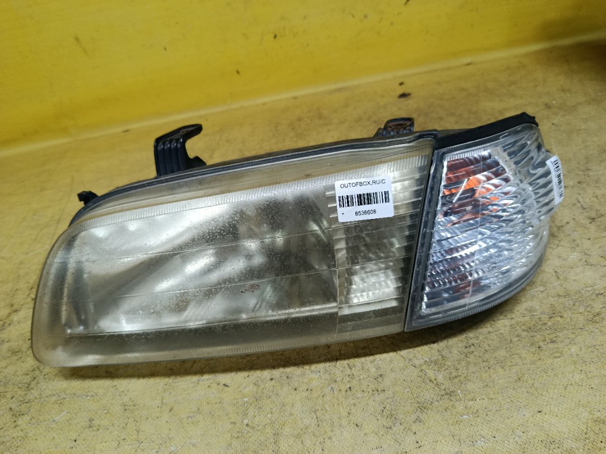 Фара 1602 1602, на Nissan Sunny FB15 Фото 1