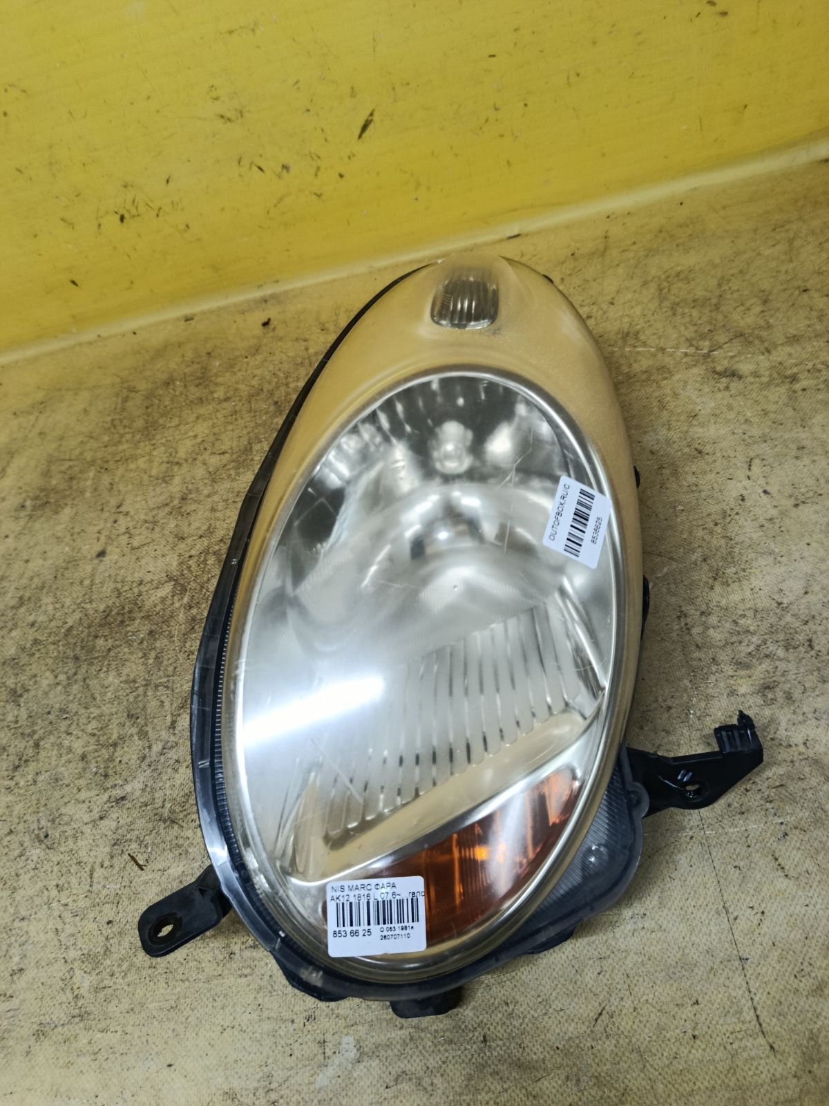 Фара 1816 1816, на Nissan March AK12 Фото 1