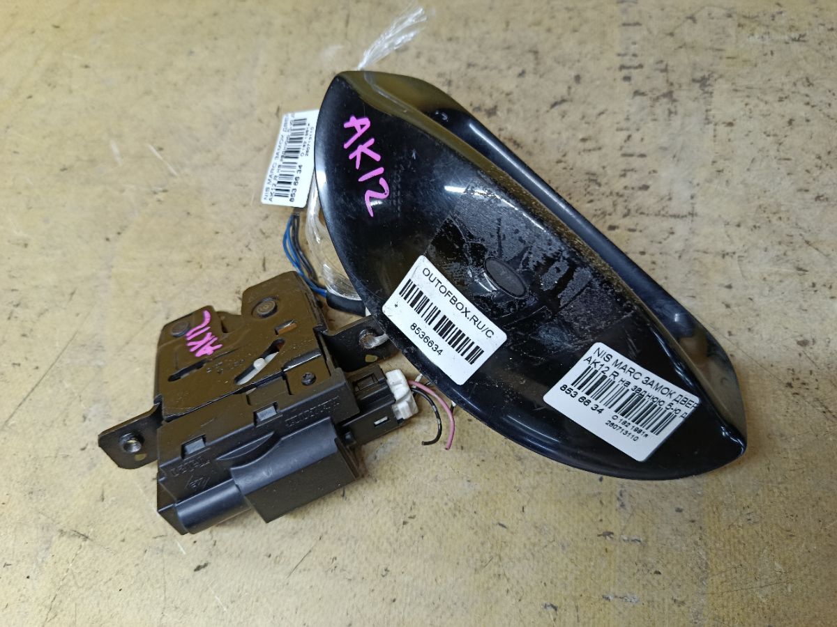 Замок двери на Nissan March AK12 Фото 1