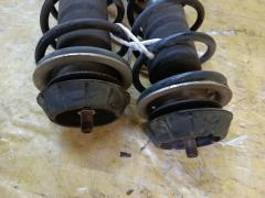 Стойка амортизатора 41601-72M20, 41602-72M20 на Suzuki Wagon R MH34S R06A Фото 3
