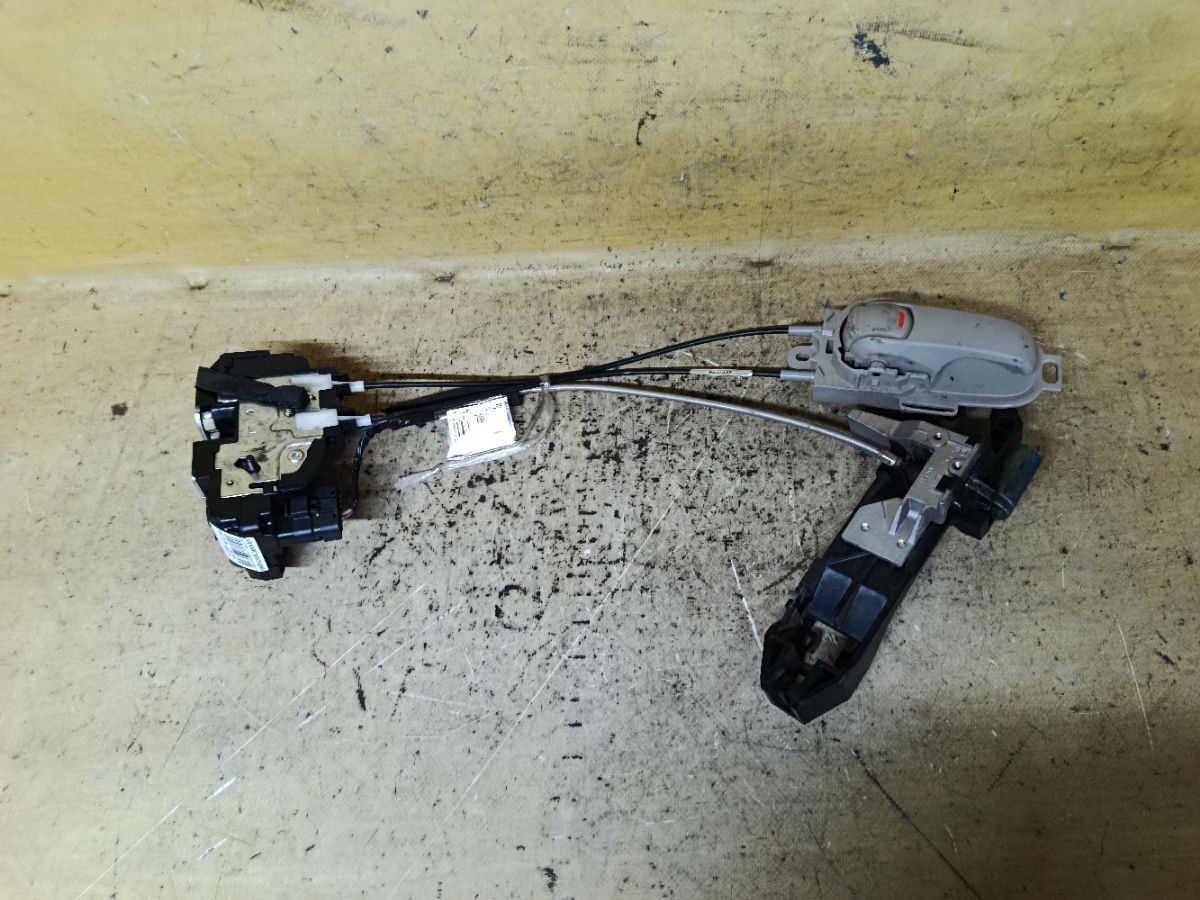 Замок двери на Nissan March AK12 Фото 2