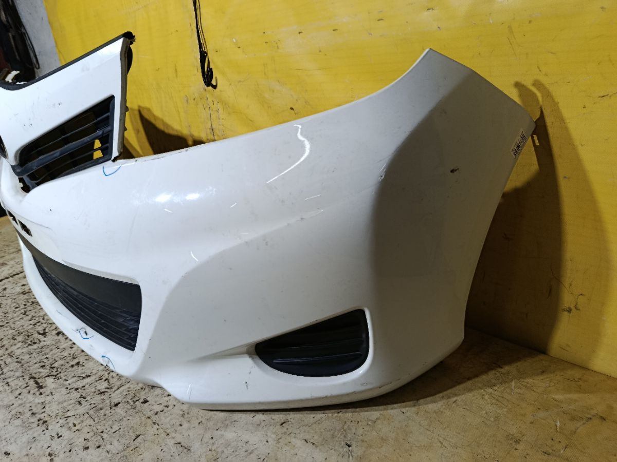 Бампер 52119-52710/30 на Toyota Vitz NSP130 Фото 2