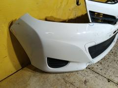 Бампер 52119-52710/30 на Toyota Vitz NSP130 Фото 4