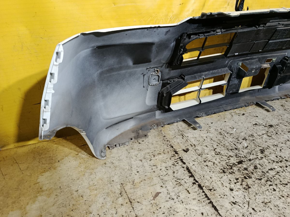 Бампер на Daihatsu Move LA150S Фото 8