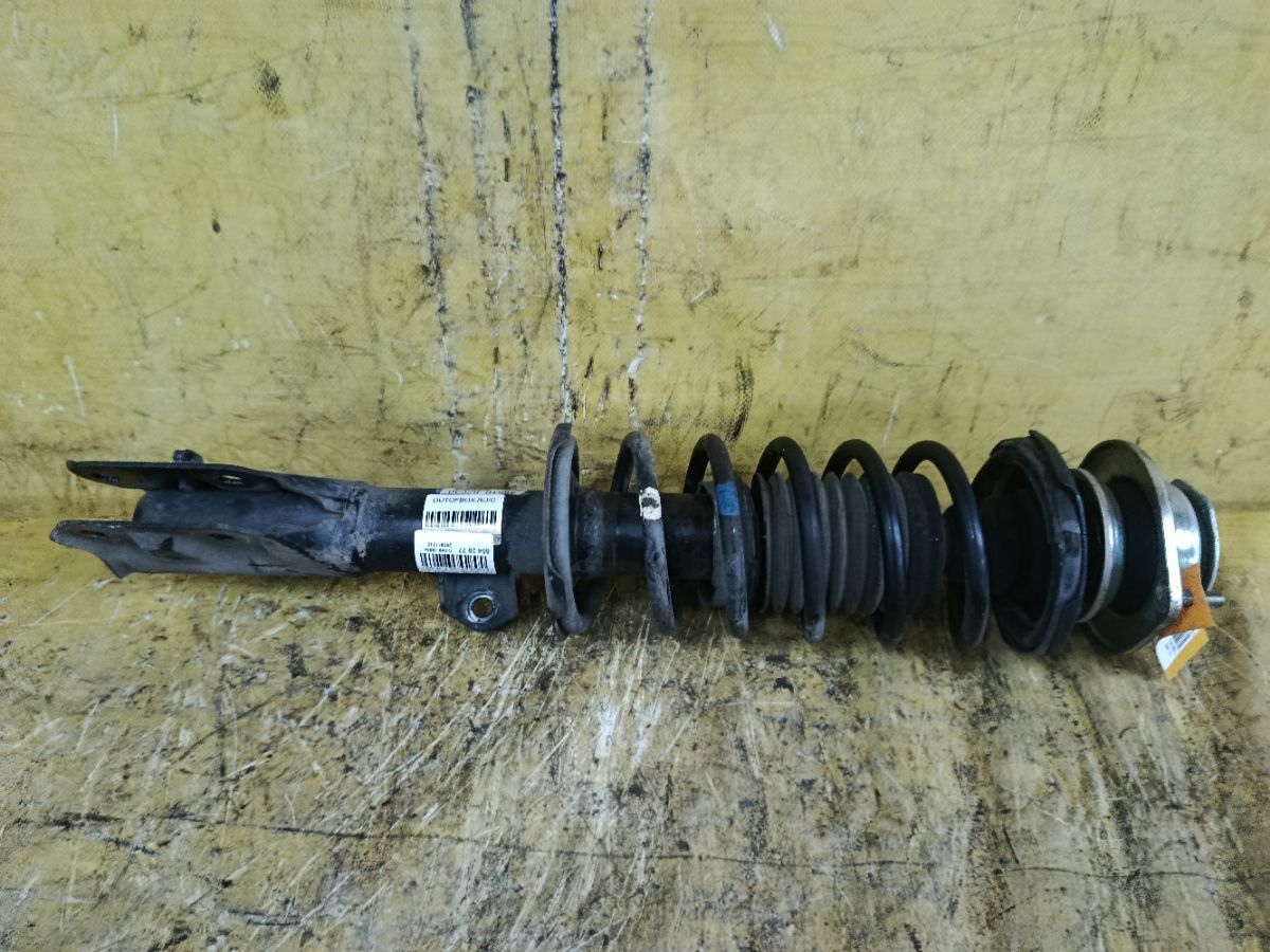 Стойка амортизатора 48510-B2C30 на Daihatsu Move LA100S KF-VE Фото 1