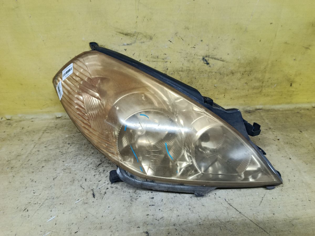 Фара 1698 1698, на Nissan Wingroad WFY11 Фото 1