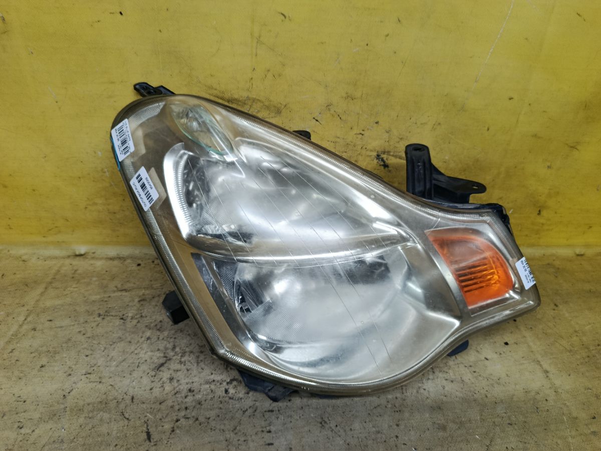 Фара 100-63823 100-63823, на Nissan Bluebird Sylphy KG11 Фото 1