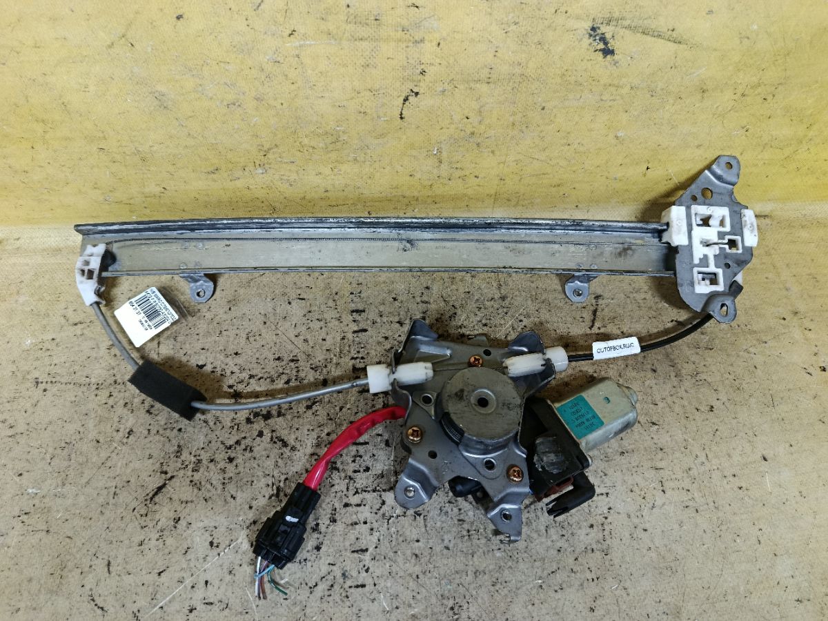 Стеклоподъемный механизм 80730-AX004 на Nissan March AK12 Фото 2