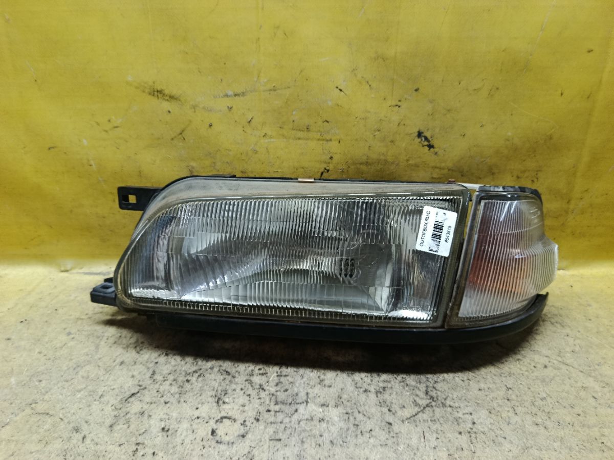 Фара 1544 1544, на Nissan Wingroad WFY10 Фото 1